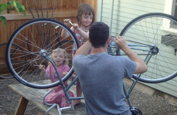 Kids help build up a fixie