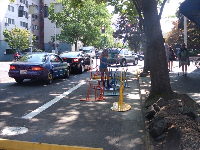 Artful bike rack outside Kiva